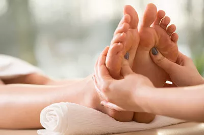 Curing ailment with massage therapy